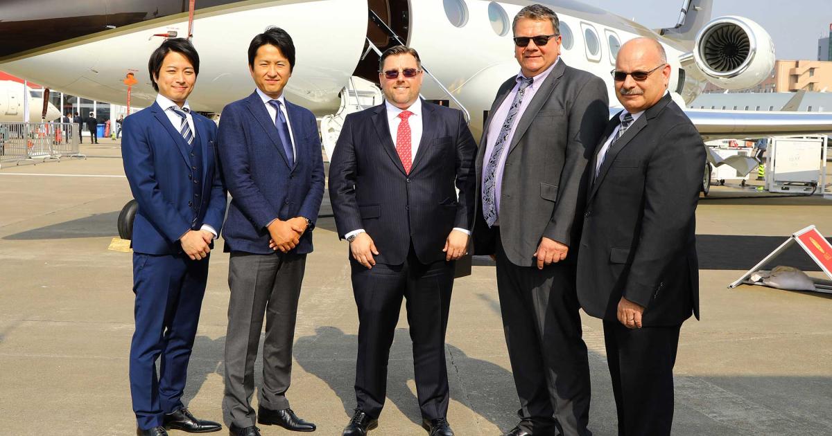 Celebrating Phenix Jet’s Cayman MRO approval are (l to r) Sho Murakami, v-p of sales, Yohei Sakurai, COO, and Andrew Svoboda, president and CEO of Phenix Jet, joined by Guy Healey and Lindsay Cadenhead from the Civil Aviation Authority of the Cayman Islands. 