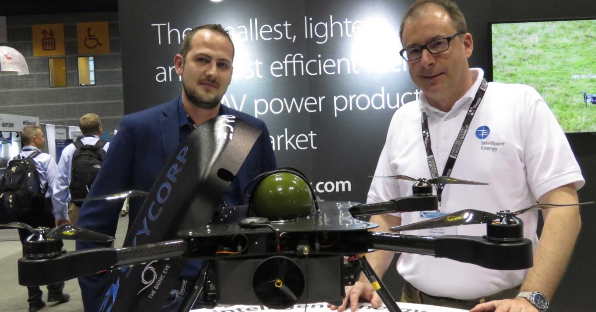 Skycorp CEO Marek Alliksoo (L) and Intelligent Energy's Lee Juby with the e-Drone Zero. (photo: Mark Huber) 