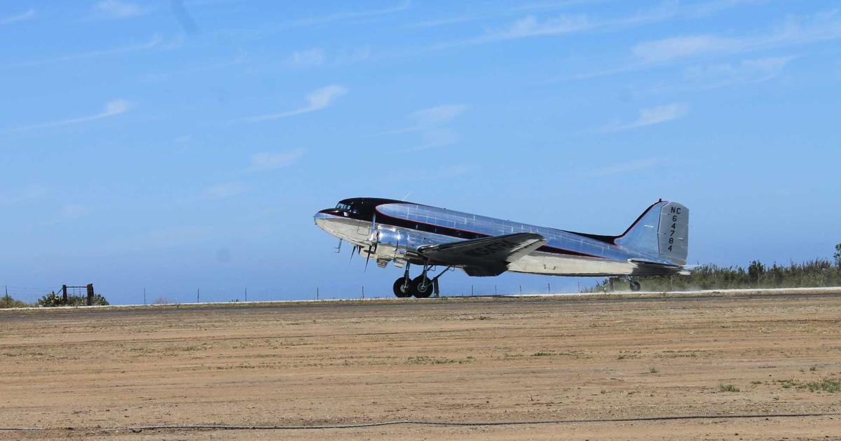 A World War II-vintage DC-3 was chosen to make the first ceremonial landing at the ACE Clearwater Airfield at Catalina Island's newly-reopened Airport in the Sky.  The airplane was converted from a war-surplus C-47 in 1947 by Philip and Helen Wrigley, who helped establish the Catalina Island Conservancy and later donated much of their property on the island to it. The twin-engine transport changed hands several times until it was reacquired by the Wrigley's granddaughter Alison Rusack and her husband Geoff, and restored to its 1947 appearance.