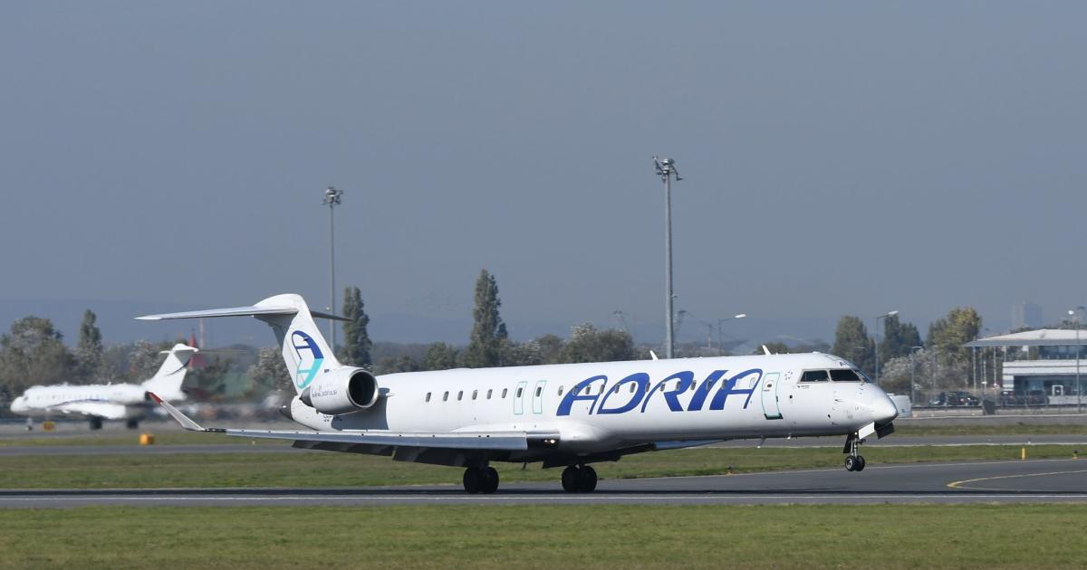 An Adria Airways Bombardier CRJ900 lands at Vienna International Airport on a flight from Pristina. (Photo: Flickr: <a href="http://creativecommons.org/licenses/by/2.0/" target="_blank">Creative Commons (BY)</a> by <a href="http://flickr.com/people/liakadaweb" target="_blank">liakada-web</a>)