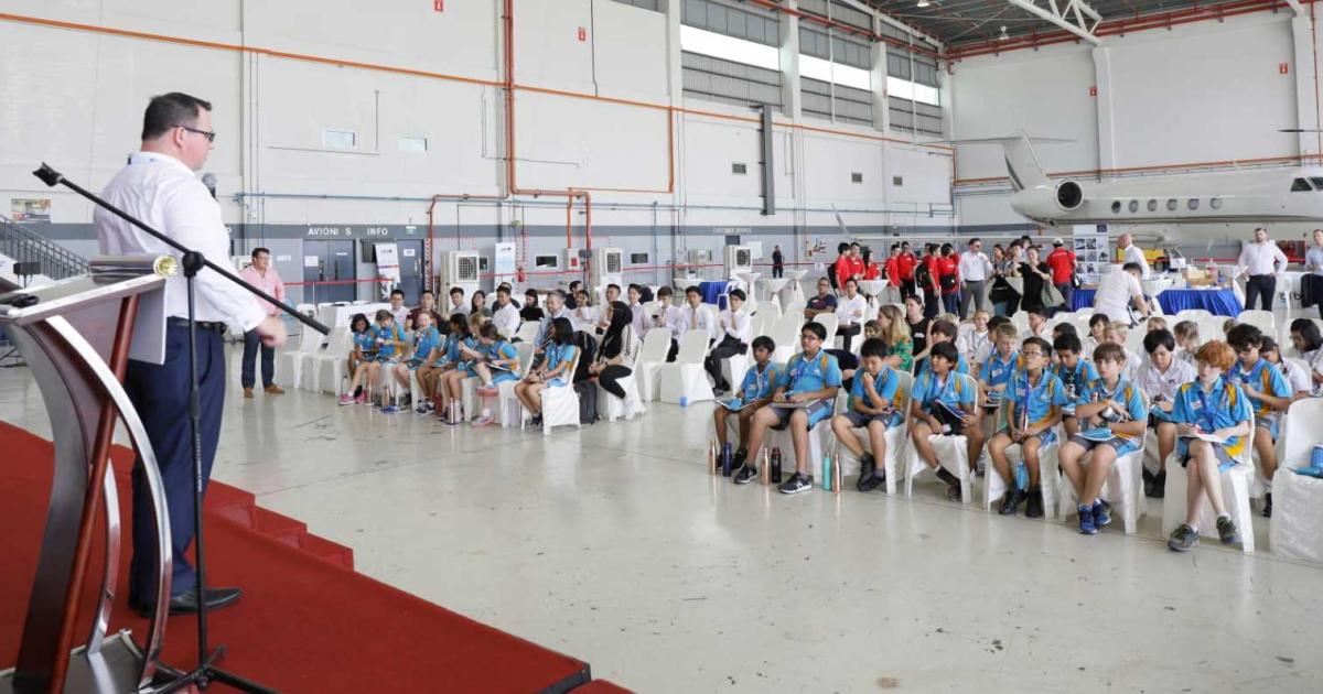 Gary Moran, AON's head of aviation for Asia, introduced the AsBAA Takes Off event to school children today in a Jet Aviation hangar at Singapore's Seletar Aerospace Park. (Photo: AsBAA)
