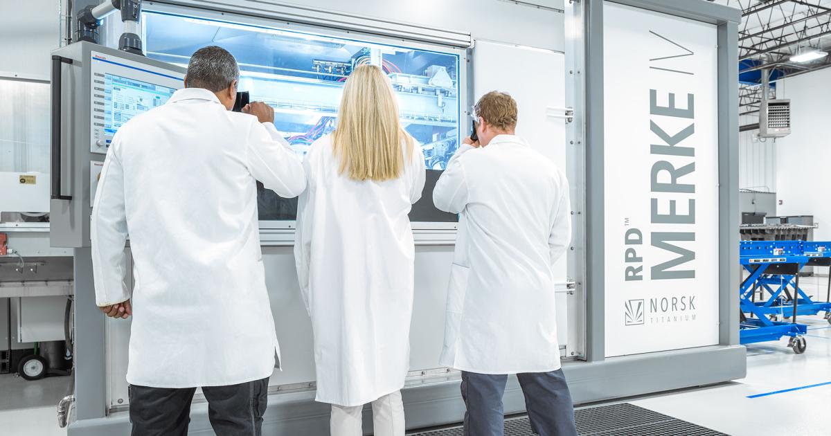 Norsk Titanium technicians monitor the Rapid Plasma Deposition (RPD) process in the company’s MERKE machine. RPD is an advanced form of additive manufacturing.