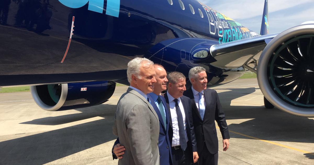 (l to r) Azul chairman David Neeleman, AerCap CEO Angus Kelly, Azul CEO John Rodgerson, and Embraer Commercial Aviation president and CEO John Slattery celebrate the delivery of Azul's first E195-E2. (Photo: Gregory Polek)