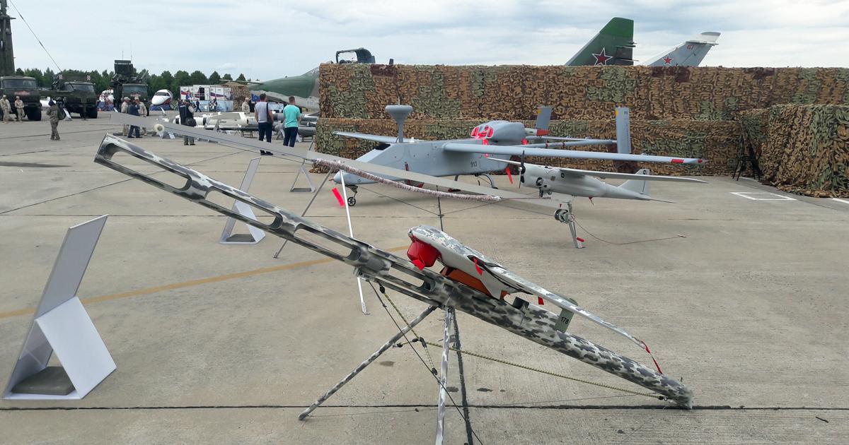 This display at the Army 2019 exhibition showcases the primary UAV types used by Russia in Syria, comprising the Eleron-3 (foreground), Orlan-10 and Forpost. (photo: Vladimir Karnozov)