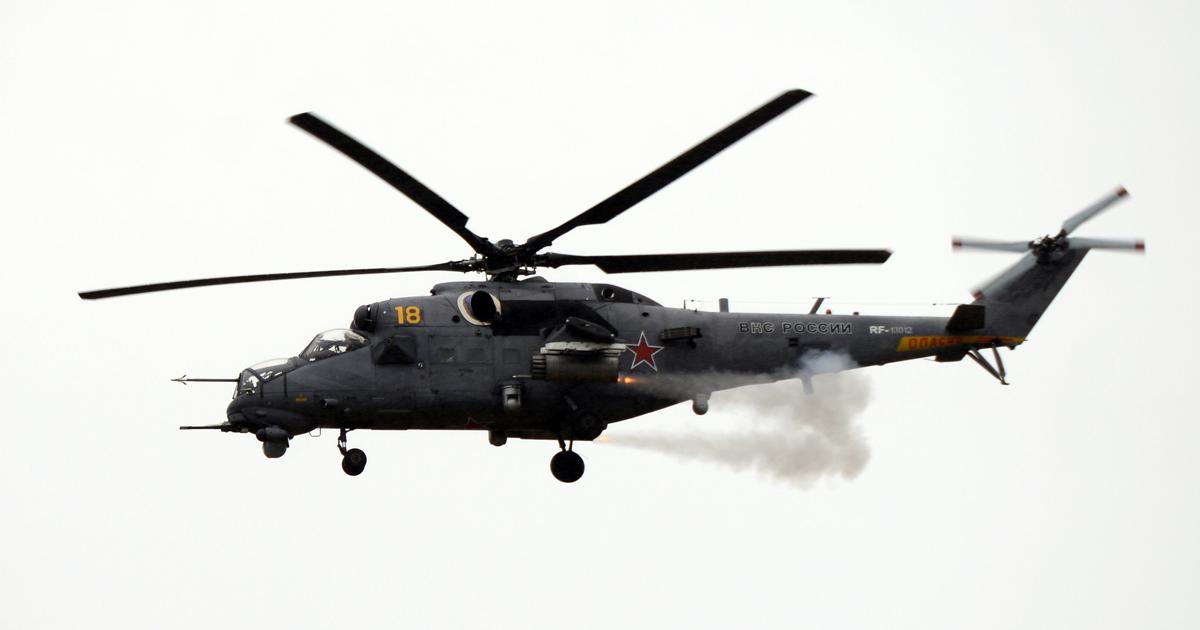 A Russian Mi-35M fires rockets during the Army 2019 exhibition. The latest “Hind” versions have fixed undercarriage and an “X”-shaped tail rotor. (Photo: Vladimir Karnozov)