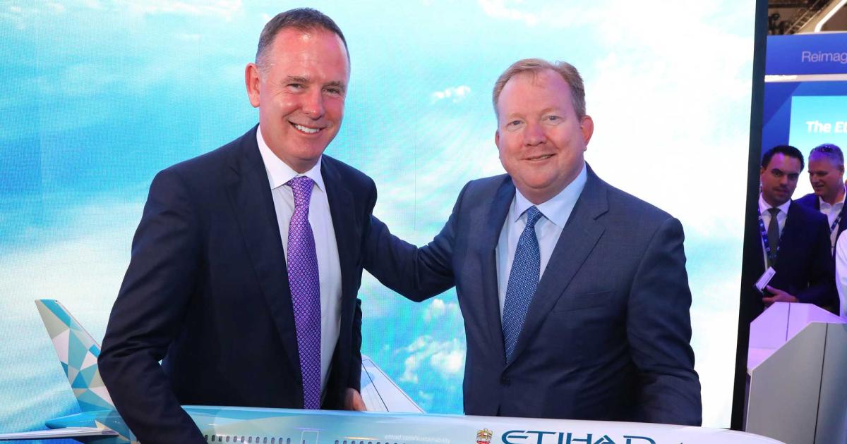 Tony Douglas, CEO of Etihad Aviation Group and Stanley A. Deal, Boeing Commercial Airplanes president launch the "Etihad Greenliner." (Photo: David McIntosh)