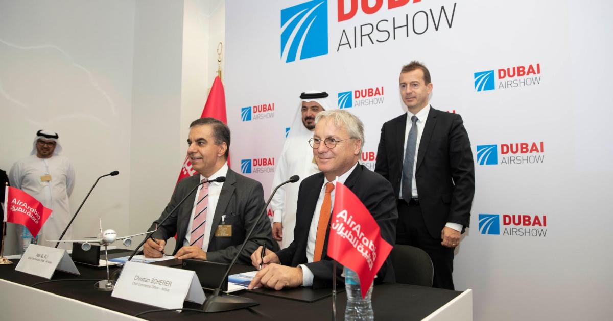 Air Arabia Group Chief Executive Officer of Air Arabia Adel Al Ali (left, foreground) and Airbus chief commercial officer Christian Scherer (right, foreground) prepare to sign an order covering 120 A320neos. (Photo: Airbus)