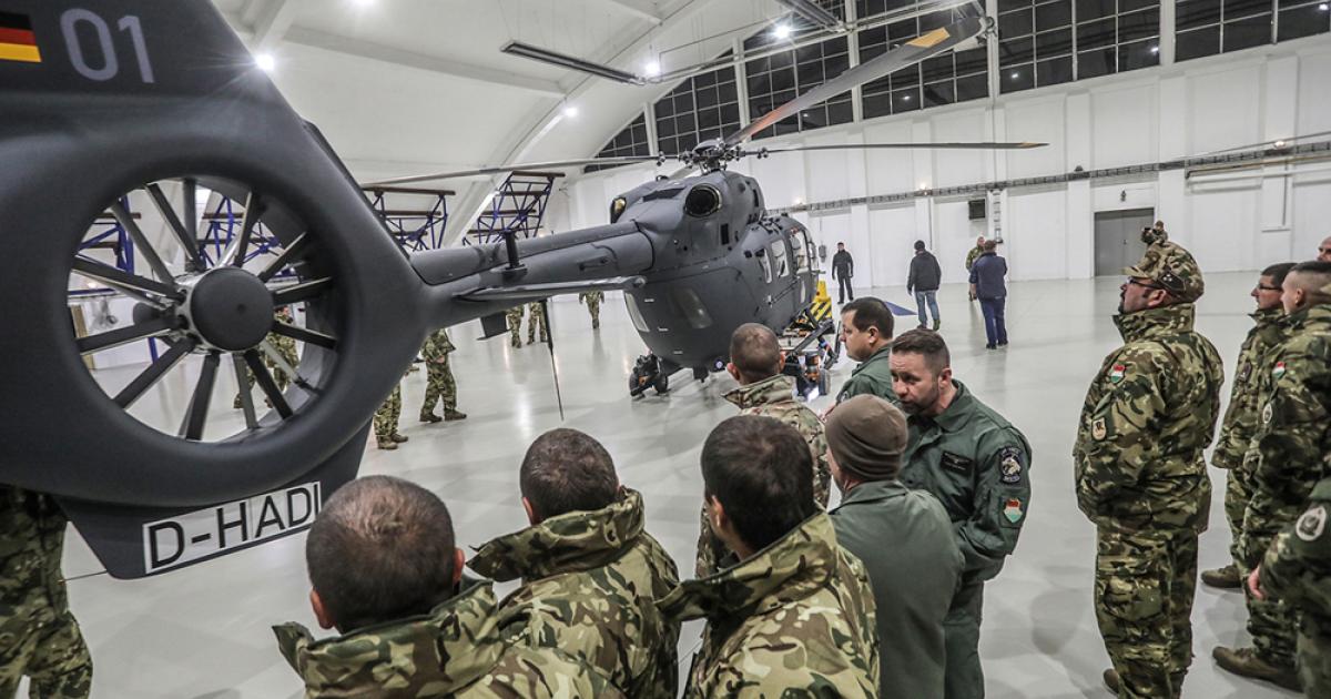 Hungarian air force personnel inspect the first H145M at Szolnok, to where it was ferried from the factory at Donauwörth, Germany, by a Hungarian crew. (Photo: Hungarian MoD)