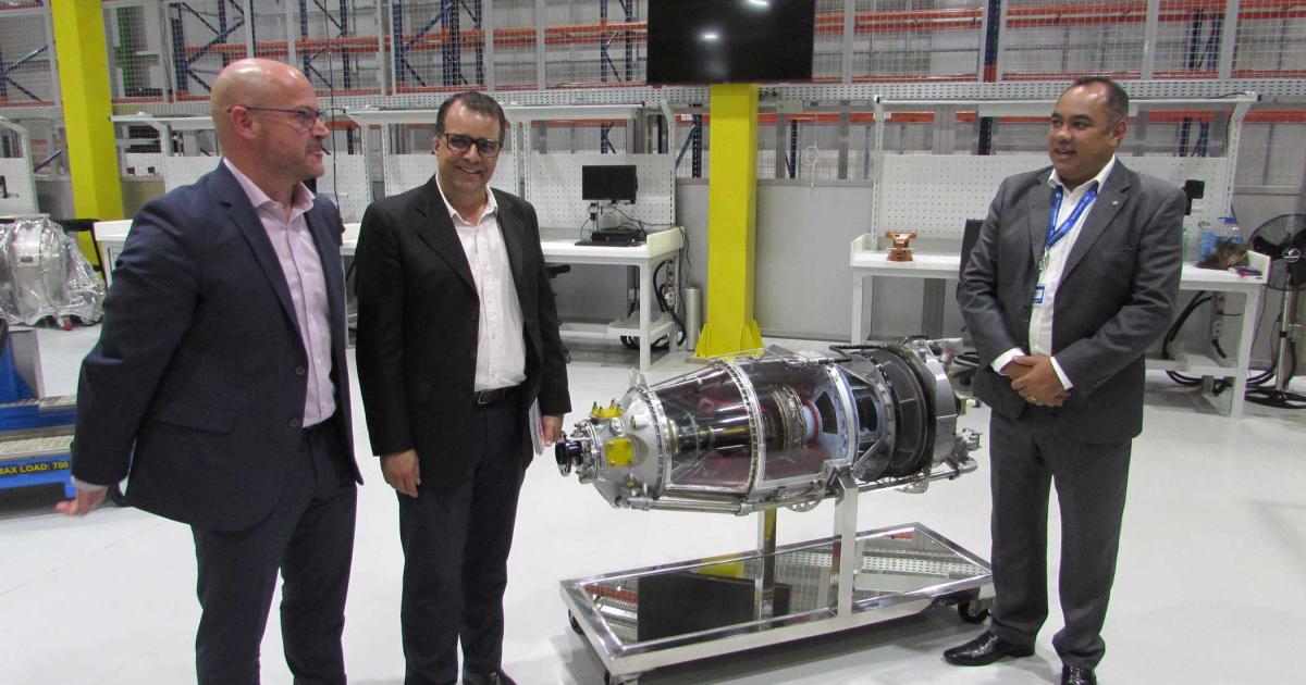 Sebastian Turcotte, IAS CEO Ronaldo Aldrin and Renato Rafael in the engine disassembly area of the Pratt & Whitney engine overhaul facility in Belo Horizonte, Minas Gerais, Brazil.