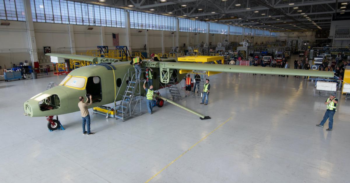 Textron Aviation workers successfully mated the wings and fuselage of its prototype SkyCourier. (Photo: Textron Aviation)