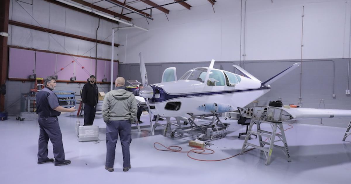 Duncan Aviation's Matt Stolz, center, leads a tour of the Lincoln, Nebraska-based MRO provider's training area that it established for its airframe technician apprenticeship program. (Photo: Duncan Aviation)