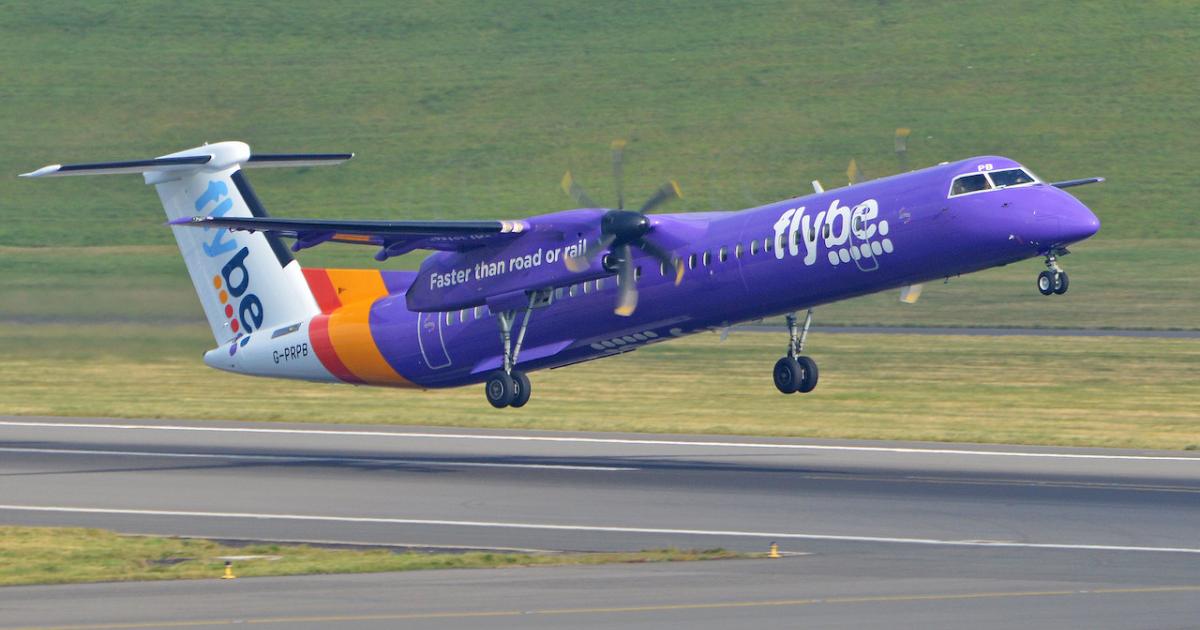 A Flybe De Havilland Dash 8-400 takes off from Birmingham International Airport in the UK. (Photo: Flickr: <a href="http://creativecommons.org/licenses/by-sa/2.0/" target="_blank">Creative Commons (BY-SA)</a> by <a href="http://flickr.com/people/ajw1970" target="_blank">Hawkeye UK</a>)