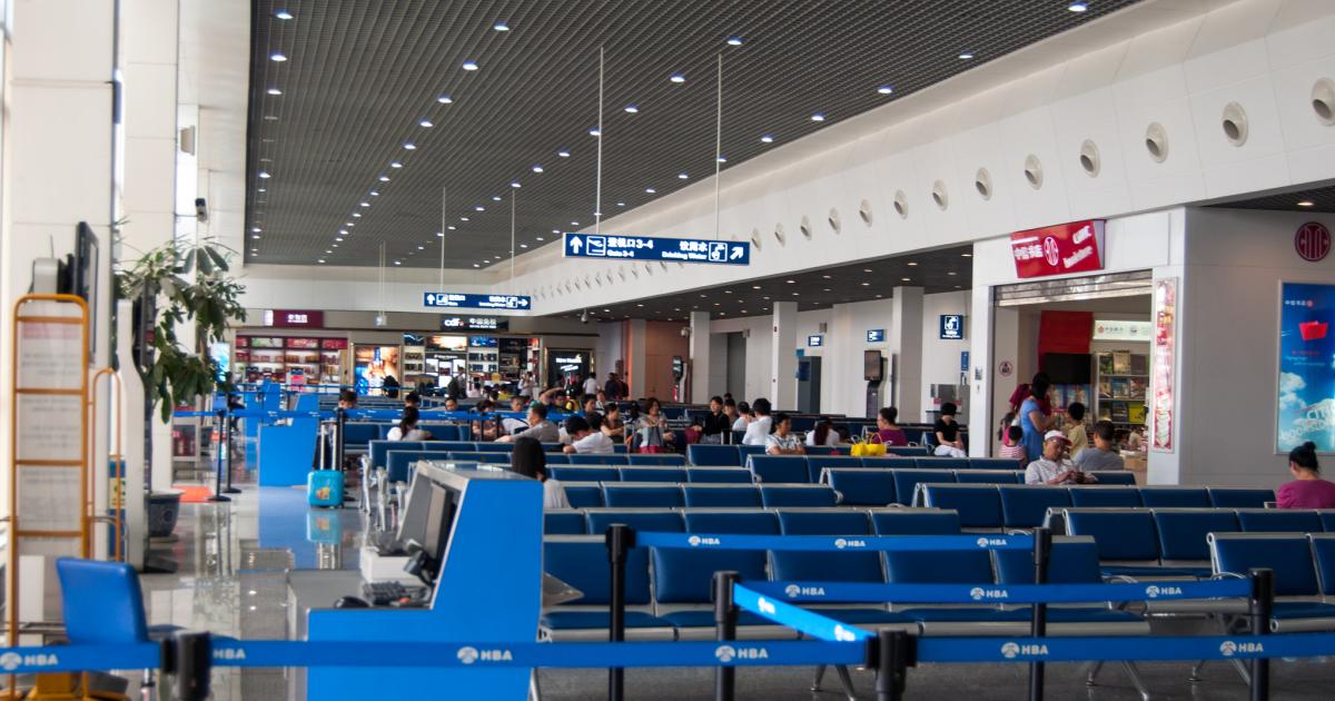 Passengers wait to board at departure gates at Wuhan Tianhe International Airport. (Photo: Meraj Chhaya, Flickr Creative Commons) 