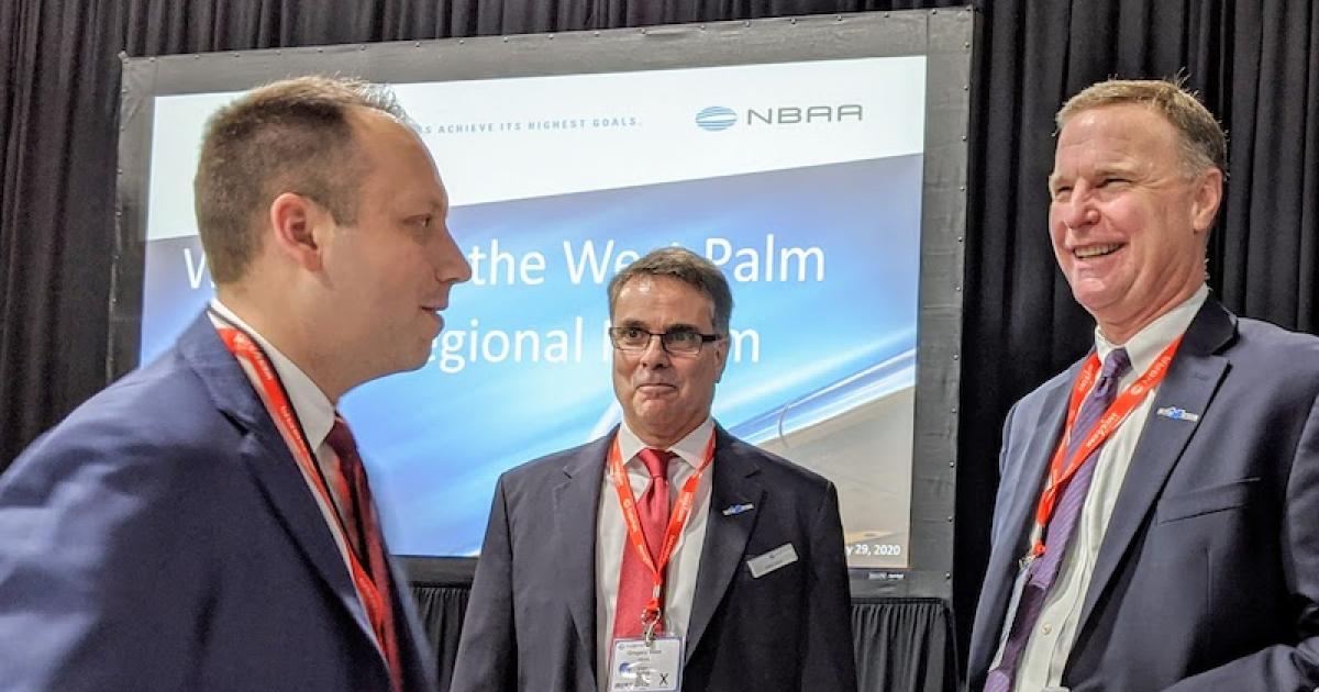 Palm Beach County Mayor Dave Kerner, left, speaks with NBAA's Greg Voos and Ed Bolen at NBAA's West Palm Beach Regional Forum yesterday in Florida. (Photo: Amy Laboda)