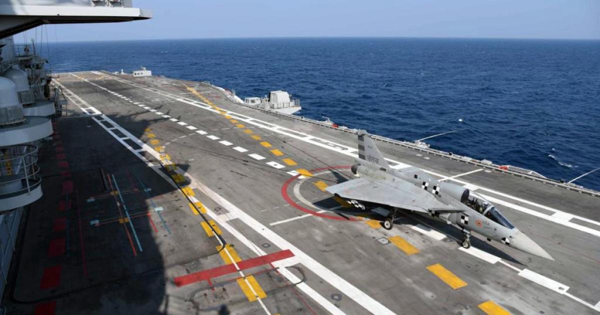 The Naval LCA technology demonstrator lands on Vikramaditya for the first time on January 11. (photo: Indian Navy)