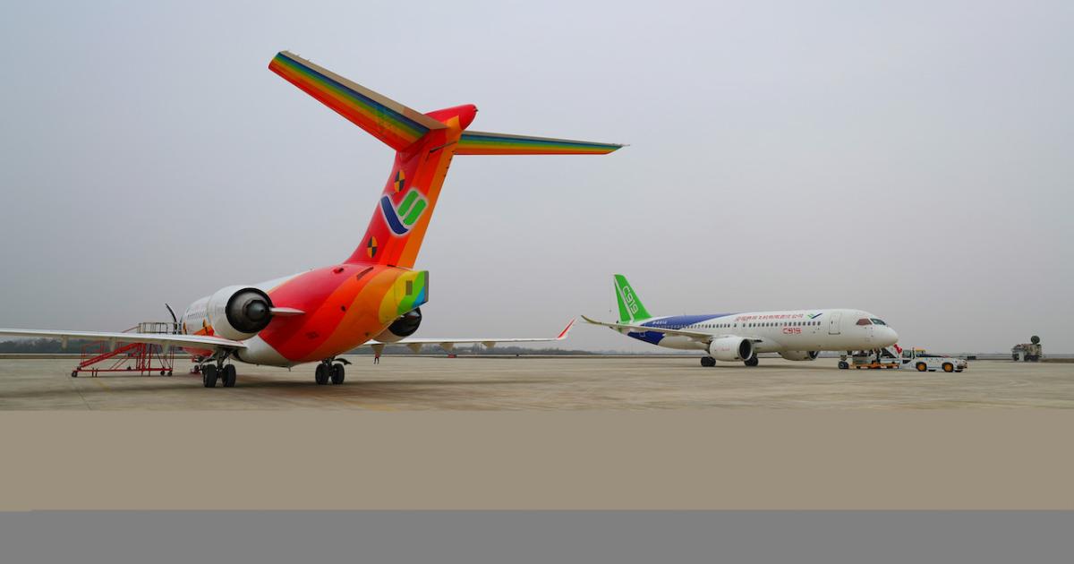 A Comac ARJ21 (left) and a C919 prepare for test missions at one of the narrowbody’s four flight test facilities, Nanchang Yaohu. 