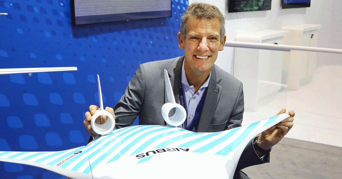 Jean-Brice Dumont, Airbus executive v-p engineering, shows off the blended-wing design.