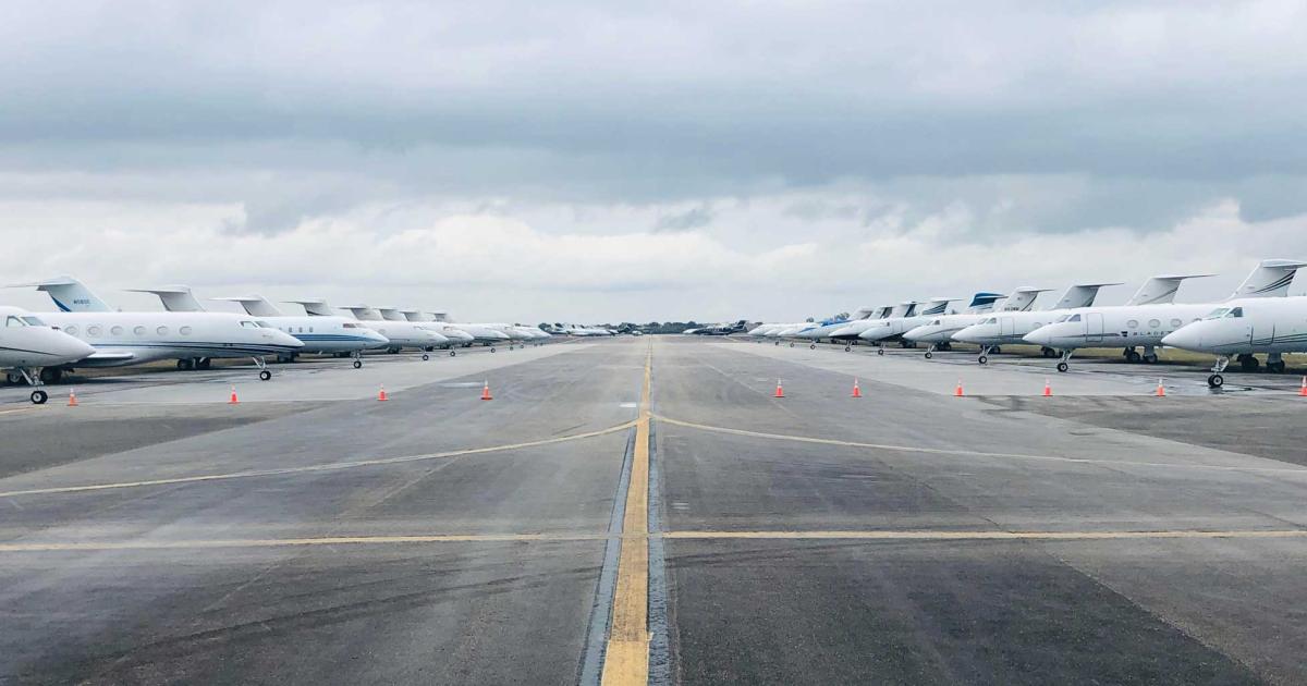 The NFL championship game played this year in Miami attracted its usual flock of business jets. At Miami Opa-locka Executive Airport, aircraft line a taxiway designated for overflow parking near the Fontainebleau Aviation ramp.