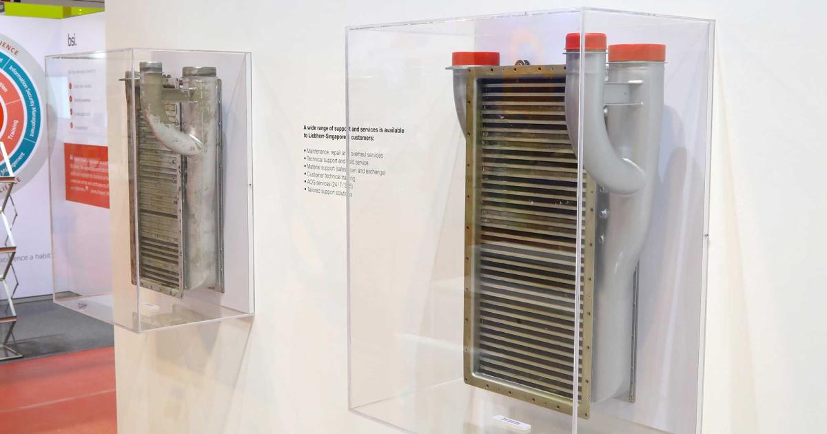 Visitors can learn more by viewing before-and-after heat exchanger repair samples. (Photo: David McIntosh/AIN)