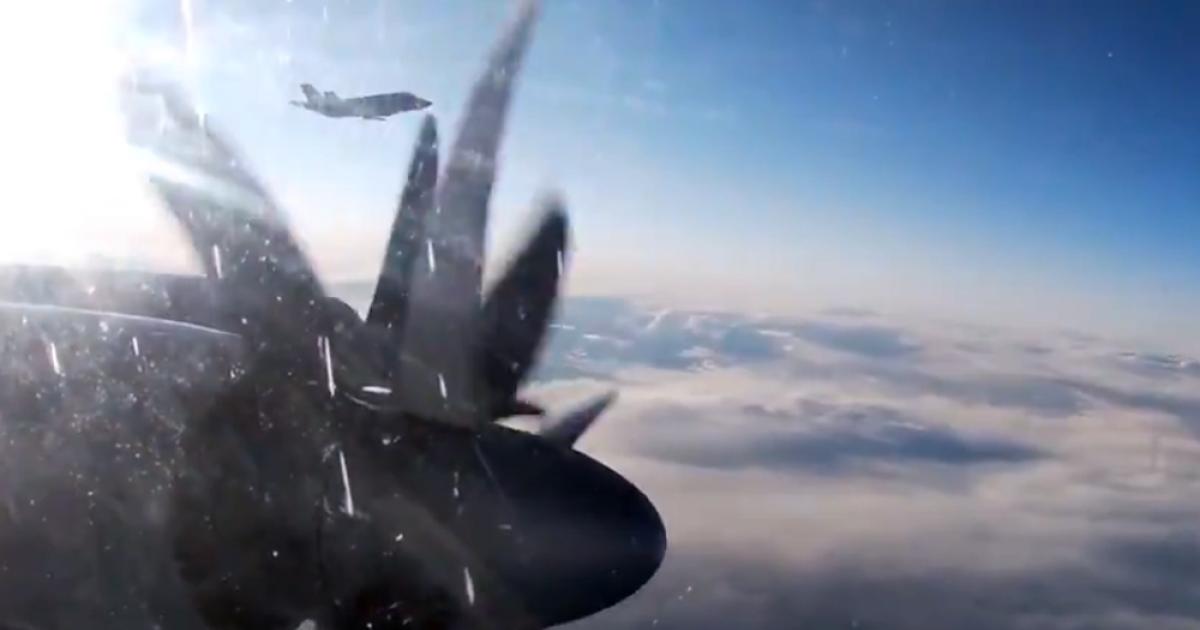 A still from a video taken from onboard a Tu-142 shows an armed Norwegian F-35A escorting the “Bear.” (Photo: Russian MoD)