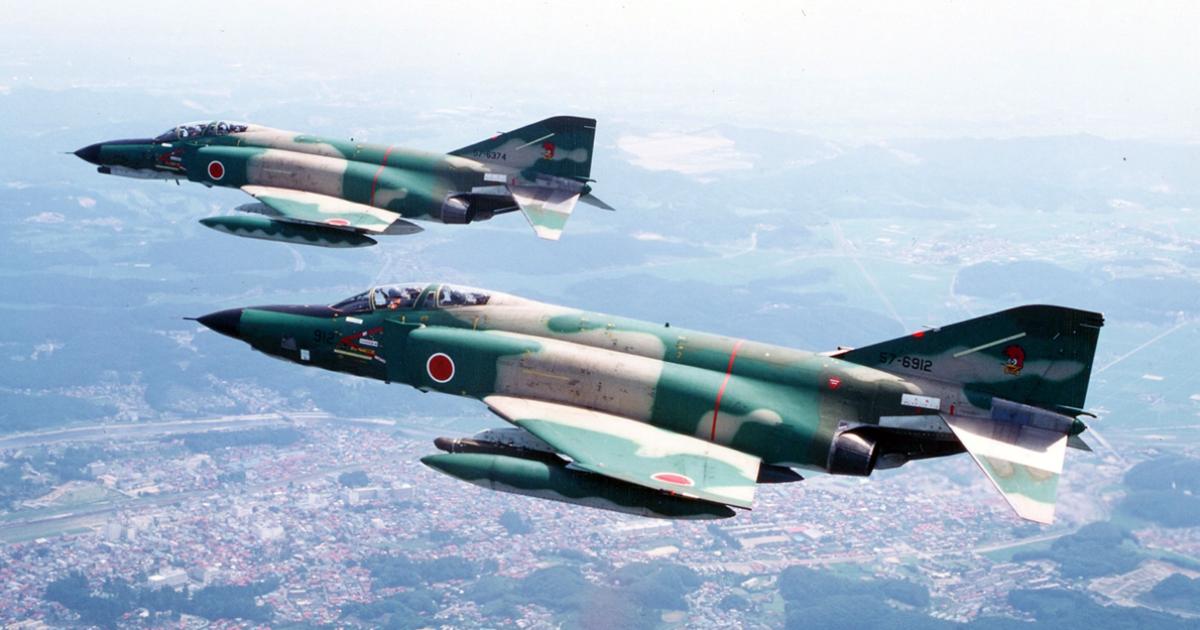 The original camera-nosed RF-4E (foreground) was joined in JASDF service with 501 Hiko-tai by the RF-4EJ (background), a fighter adapted to carry podded reconnaissance sensors. (Photo: JASDF)