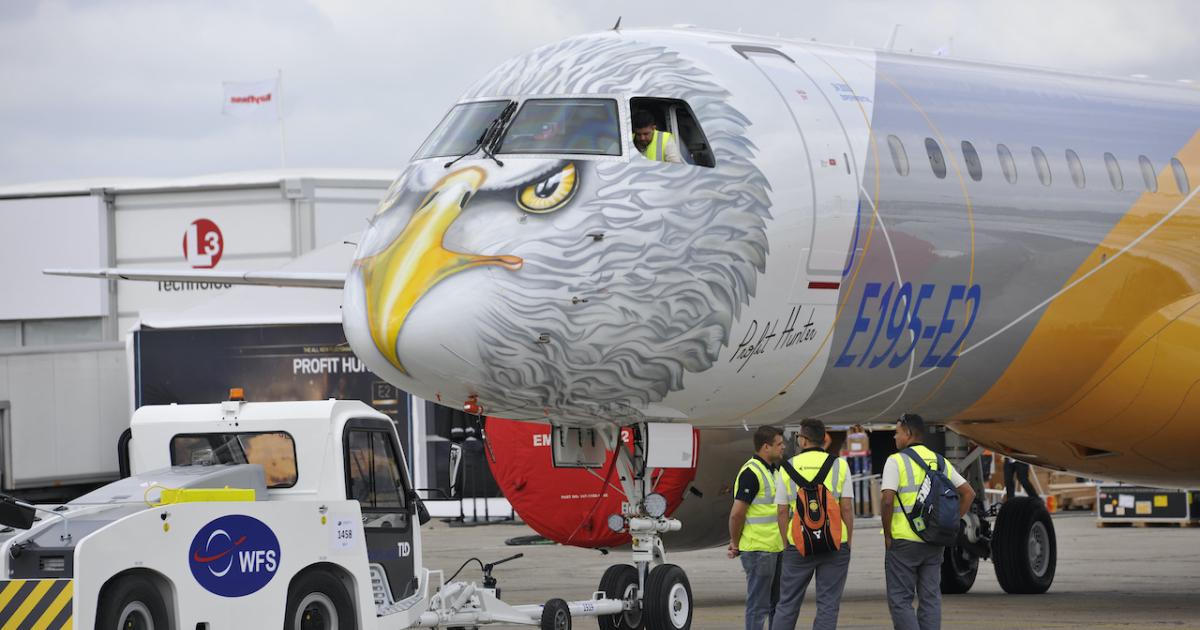 An Embraer E195-E2 in one of the company's "Profit Hunter" liveries undergoes preparation for display at the 2019 Paris Airshow. (Photo: Mark Wagner)
