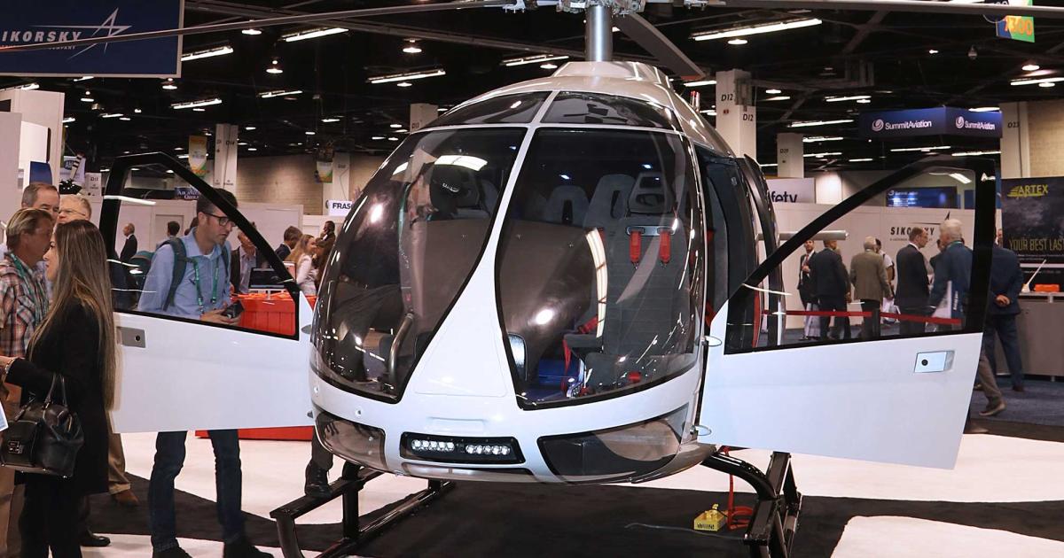 The mockup of Kopter’s SH09 light single-engine helicopter highlights the type’s roomy interior and carbon-composite airframe construction. Certification is expected later this year. 