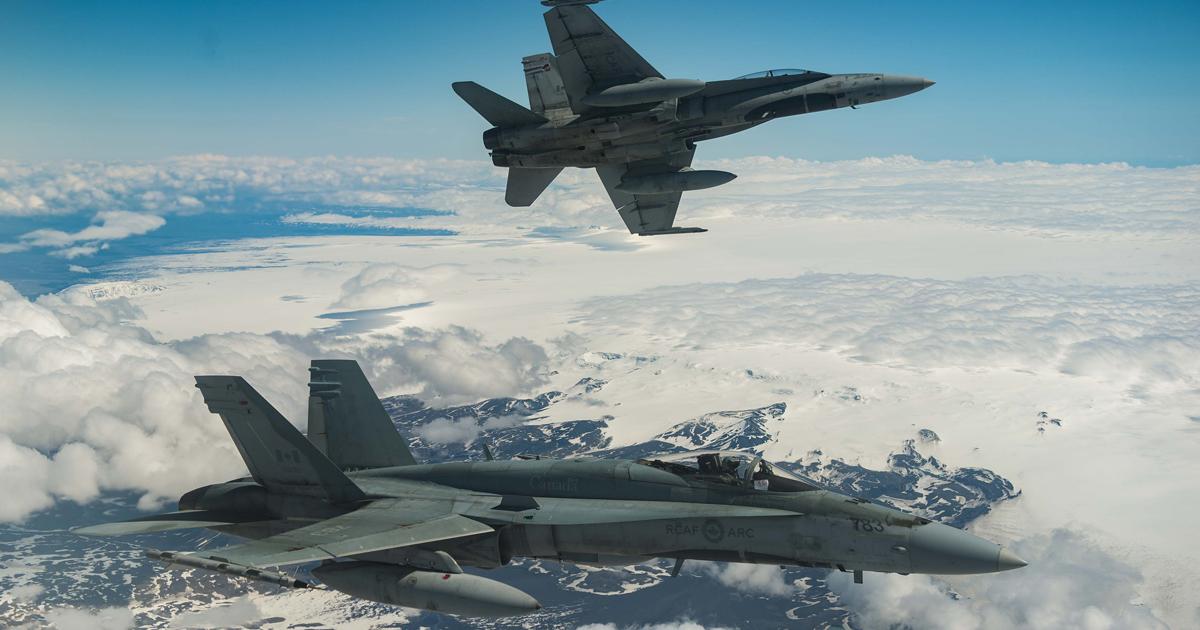 The RCAF’s Hornet fleet has commitments to both NATO and NORAD. Here CF-18s fly over Iceland during a NATO Operation Reassurance air surveillance mission in 2017. (Photo: Canadian Department of Defence)
