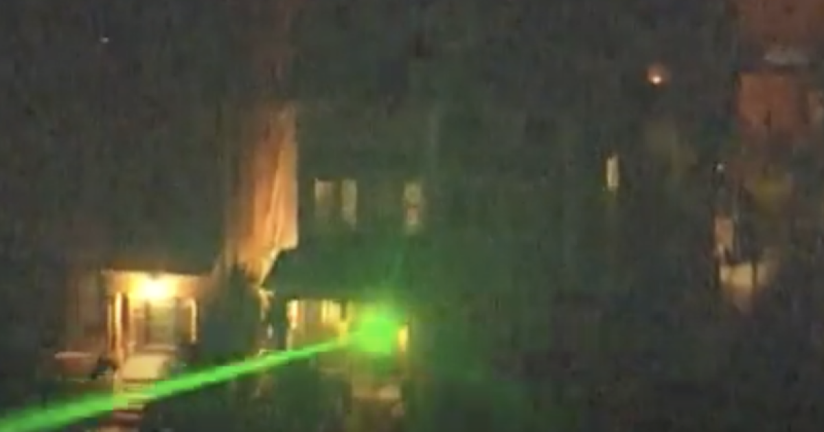 A helicopter operated for CBS television news crews in Denver was targeted by lasers during recent protests. [Photo: CBS]