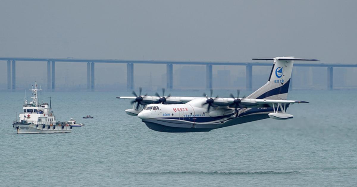 The AG600 is seen during its first flight from sea waters near Qingdao. (Photo: AVIC)