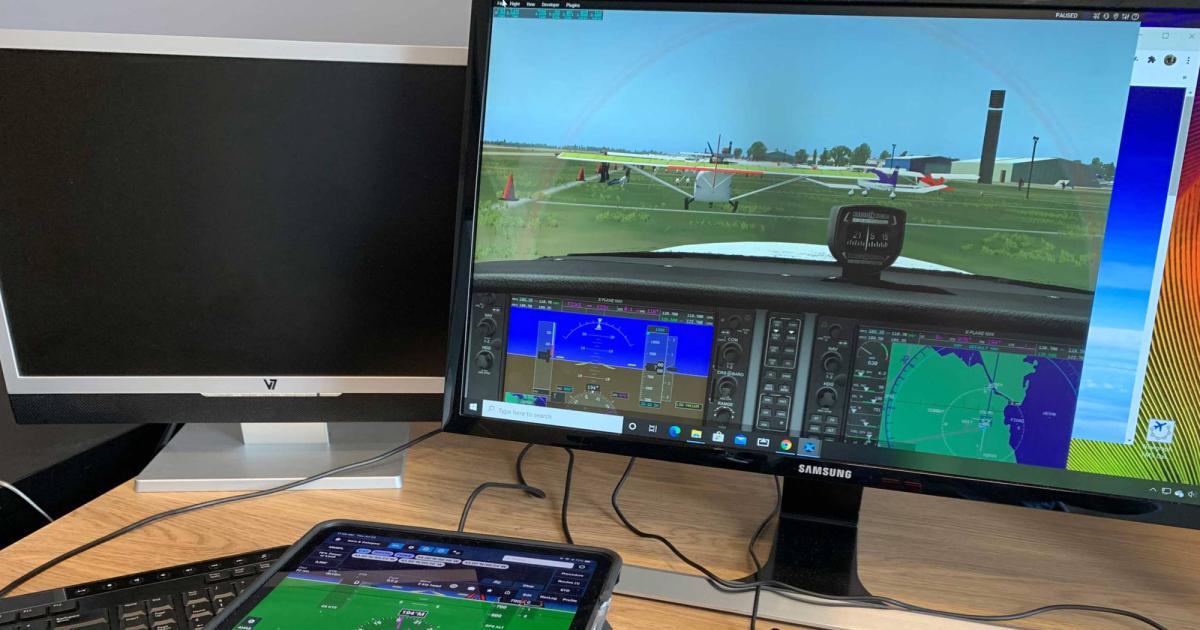 After "arriving" at a simulated EAA AirVenture, the view showed a typical summer scene at Oshkosh Airport, thanks to PilotEdge's SimVenture effort.  