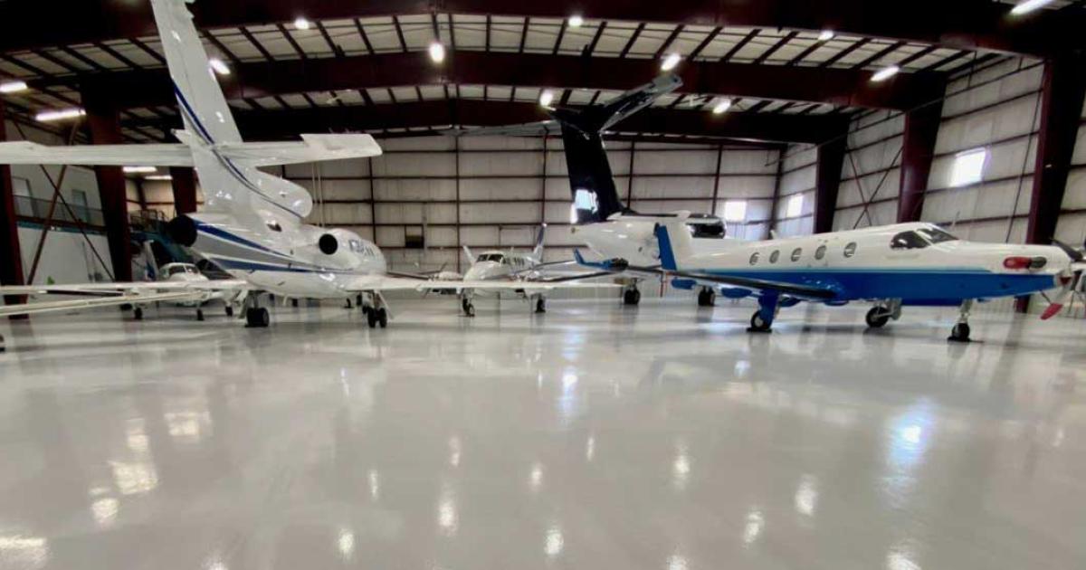 Port City Air has finished a multi-hangar renovation project, which included resurfacing the floors. The FBO currently has 90,000 sq ft of heated hangar space. A fifth 28,000 sq ft hangar capable of sheltering aircraft up to a Global 7000 is expected to come online by the end of the year. (Photo: Port City Air)