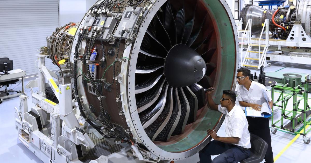 Engineers at Pratt & Whitney-SIA Engineering Company MRO joint venture Eagle Services Asia in Singapore inspect a newly overhauled PW1100G. (Photo: Pratt & Whitney)