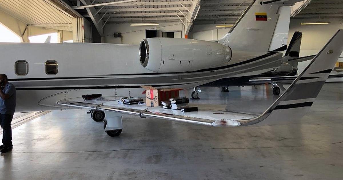 U.S. government authorities had tracked suspicious flight activity of this Learjet 55 before the U.S. Customs and Border Patrol raided the aircraft and found it loaded with nearly 90 weapons, 63,000 rounds of ammunition, and more than $20,000 in U.S. currency. (Photo: U.S. CBP)