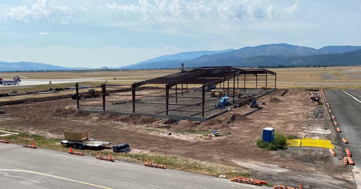A new 29,150-sq-ft hangar rises at the Minuteman Jet Center at Missoula International Airport in Montana. Scheduled for completion this fall, it will nearly double the existing aircraft storage space at the FBO which serves as a gateway to the state's Rocky Mountain region. (Photo: Minuteman Aviation)
