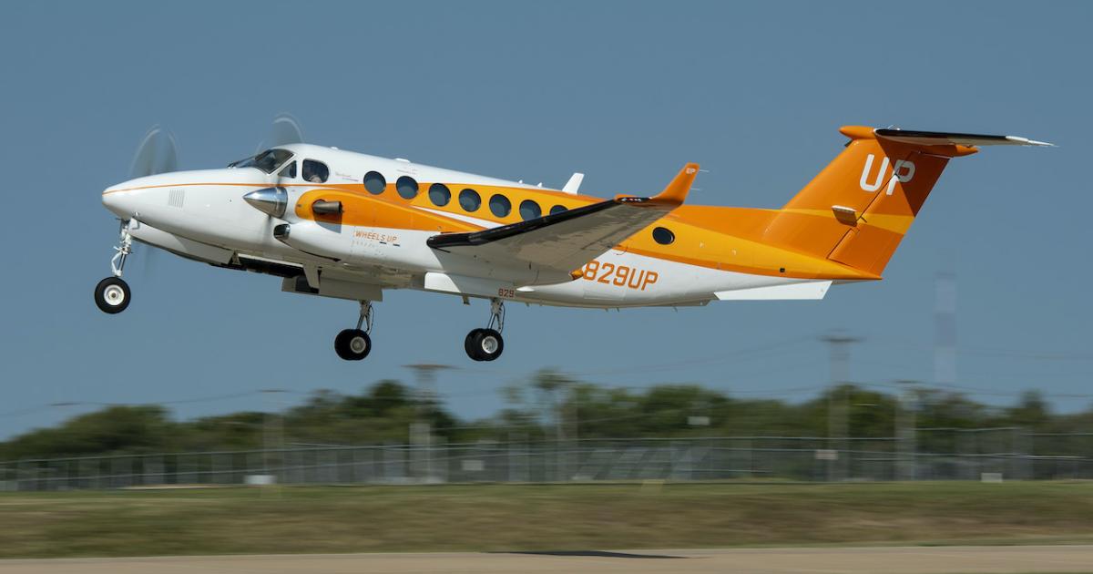 Textron Aviation donated the design and paint job of Wheels Up's orange Beechcraft King Air 350i. (Photo: Wheels Up)