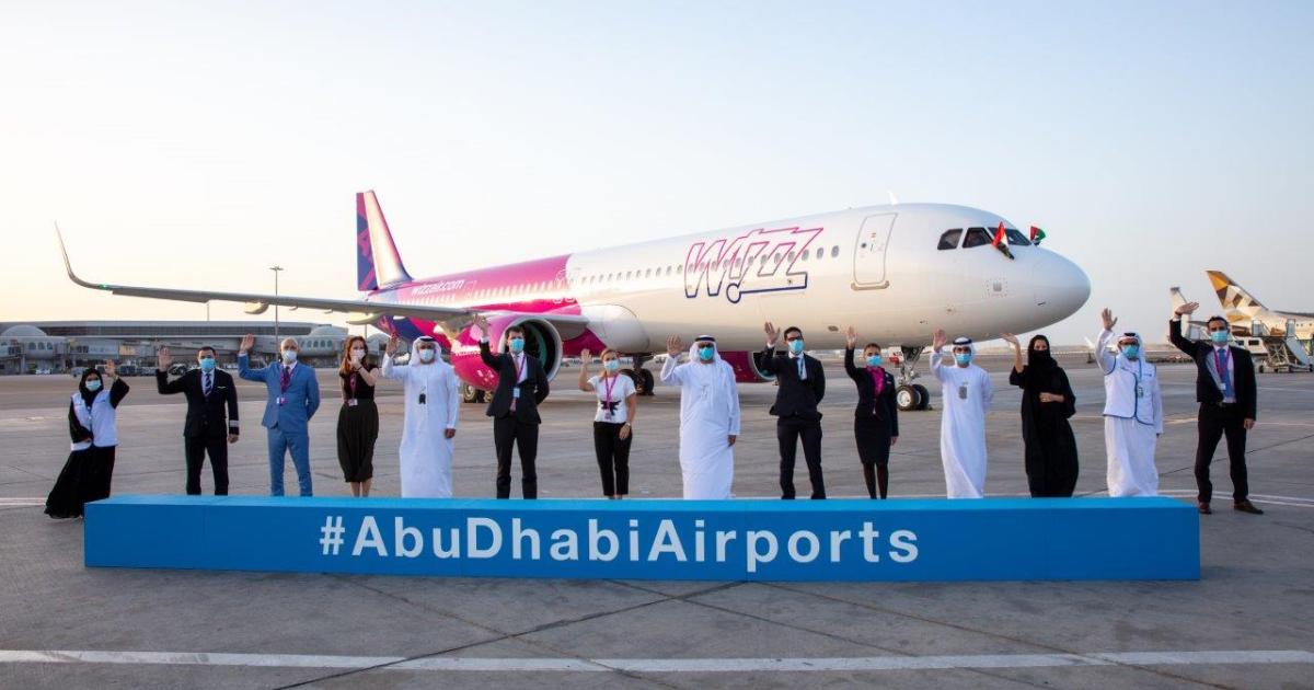 Wizz Air Abu Dhabi and Abu Dhabi International Airport officials celebrate the arrival of the new airline's first Airbus A321neo. (Photo: Abu Dhabi Airports)