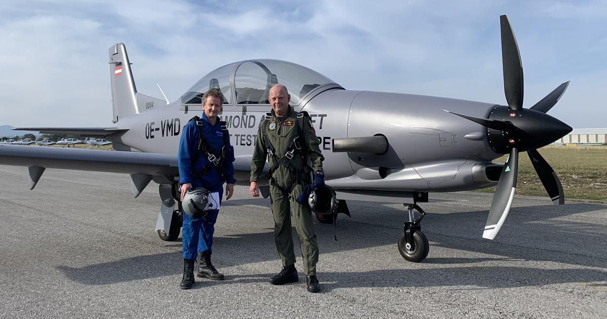 A Diamond test pilot and Colonel Goossens of the Belgian Air Force pose with the Dart-550 demonstrator after a flight from Wiener Neustadt. (Photo: Diamond Aircraft)