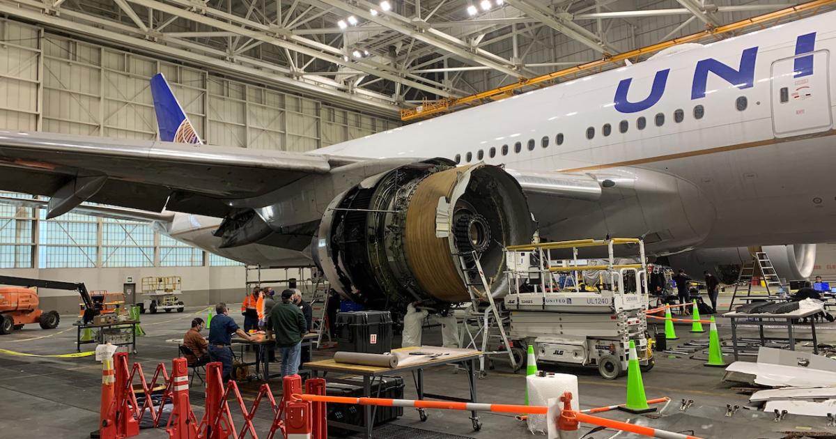 NTSB investigators record the damage to the PW4000-112 engine that failed on a United Airlines Boeing 777-200. (Photo: NTSB)
