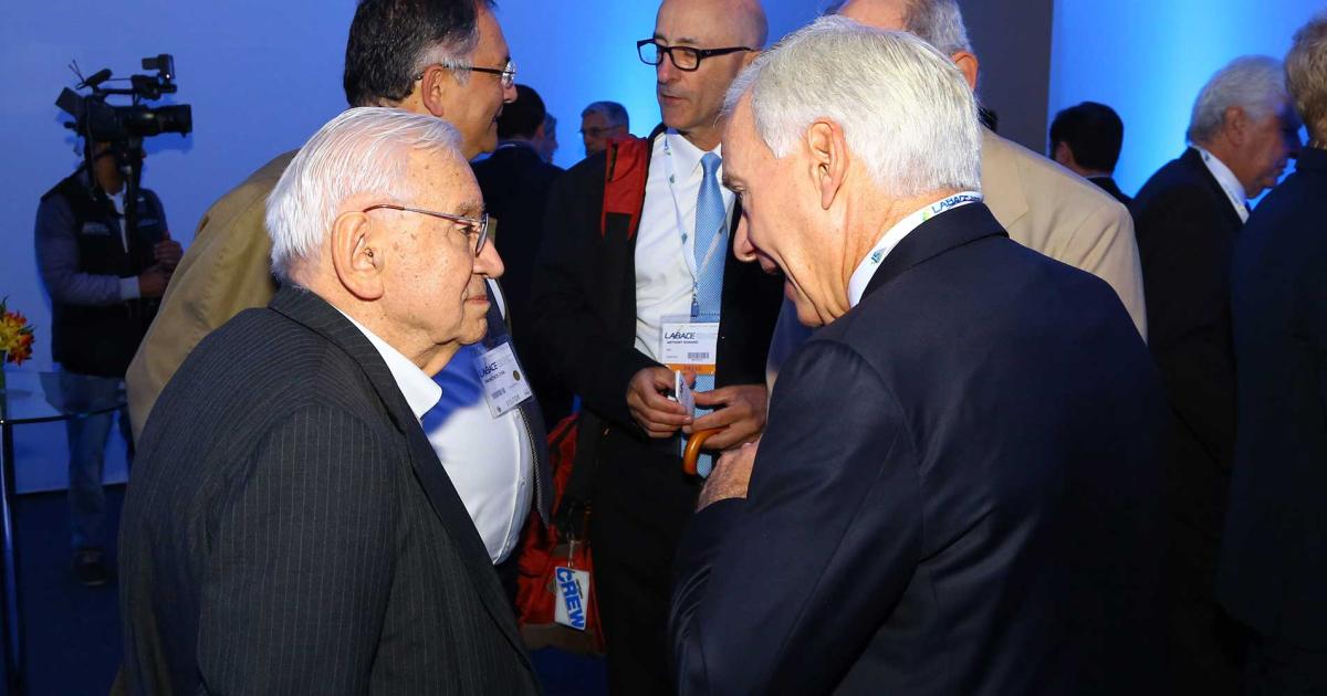 Ozires Silva, left, who helped found Embraer in 1969, joined a list of industry pioneers ranging from William Boeing to Igor Sikorsky and Charles Lindbergh who have received the Daniel Guggenheim Medal. (Photo: David McIntosh)