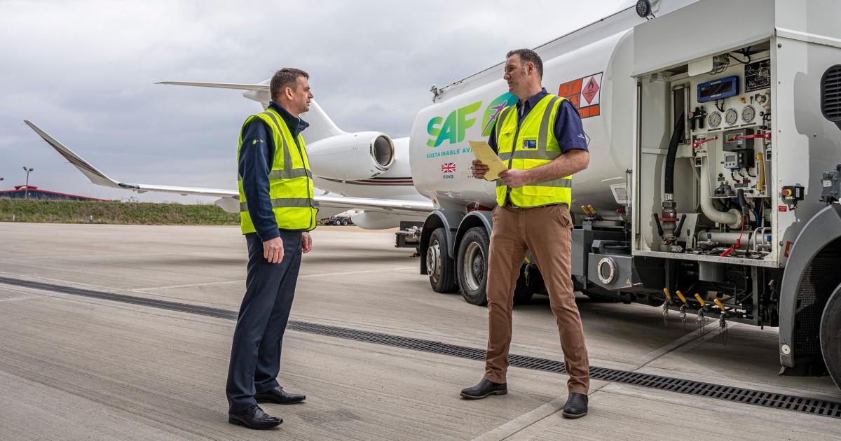 Stephen Elsworthy, manager of fuel services, London Biggin Hill Airport (r.) accepts the dedicated business aviation gateway's first load of sustainable aviation from Martin Lane, Air bp's UK general aviation manager. (Photo: London Biggin Hill Airport)