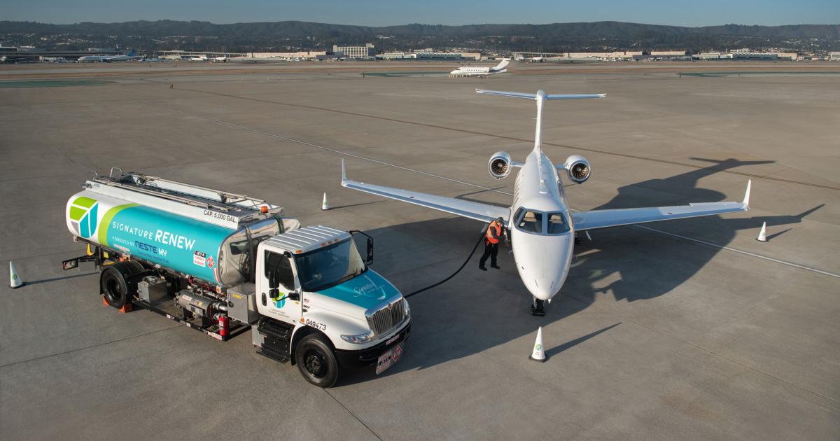 An Embraer Phenom 300 uplifts sustainable aviation fuel at the Signature Flight Support FBO in San Francisco. The Signature Renew fuel is a 30/70 blend of renewable feedstock and conventional jet-A that yields a 25 percent reduction in direct carbon output from aircraft versus traditional jet fuel. (Photo: Signature Flight Support)