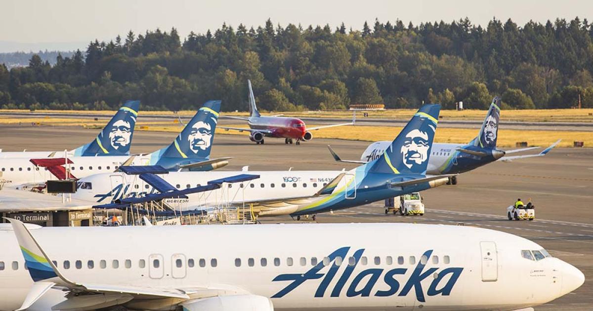 An Alaska Airlines Boeing 737-900ER (foreground) and Horizon Air Embraer E175s populate a ramp at Seattle-Tacoma International Airport. (Photo: Alaska Air Group)