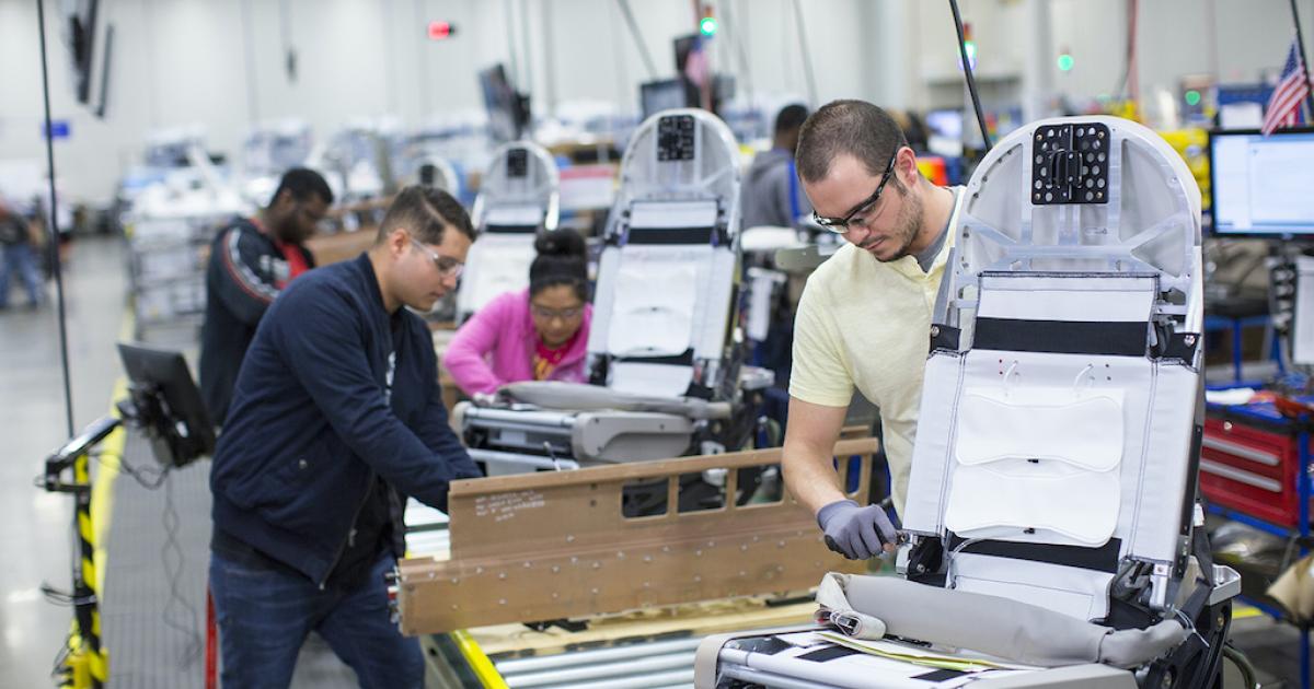 Workers at Collins Aerospace's plant in Winston-Salem, North Carolina, assemble Super Diamond business class seats used in the Boeing 777 and 787 and the Airbus A350 and A330. Collins also enjoys strong positions in narrowbody programs such as the 737 Max, giving it the diversification it needs to emerge effectively from the pandemic. (Photo: Collins Aerospace)