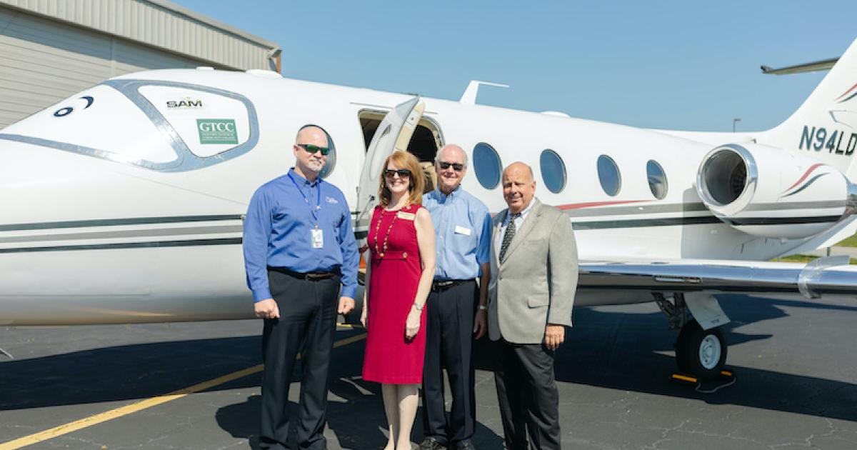 From left, Guilford Technical Community College (GTCC) director of aviation programs Nick Yale, GTCC senior v-p of instruction Beth Pitonzo, GTCC trustee David Miller, and Sky Aviation Holdings president Tom Conlan. (Photo: GTCC)