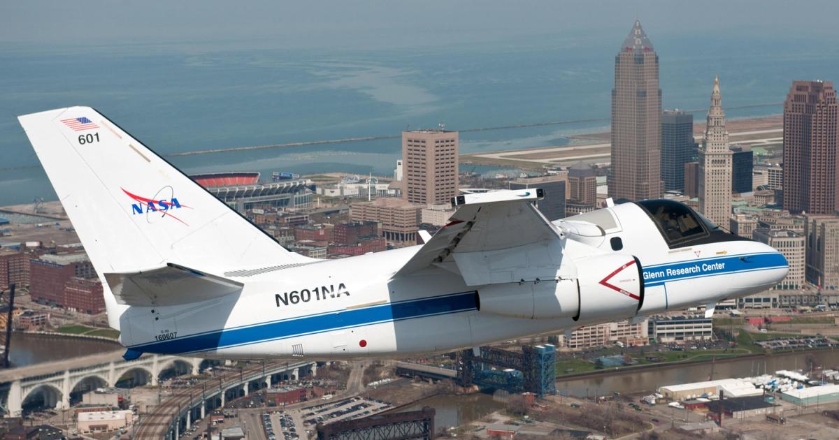 N601NA—the world’s last flying S-3 Viking—flies over Cleveland, Ohio, with Burke Lakefront Airport in the background. (Photo: NASA)