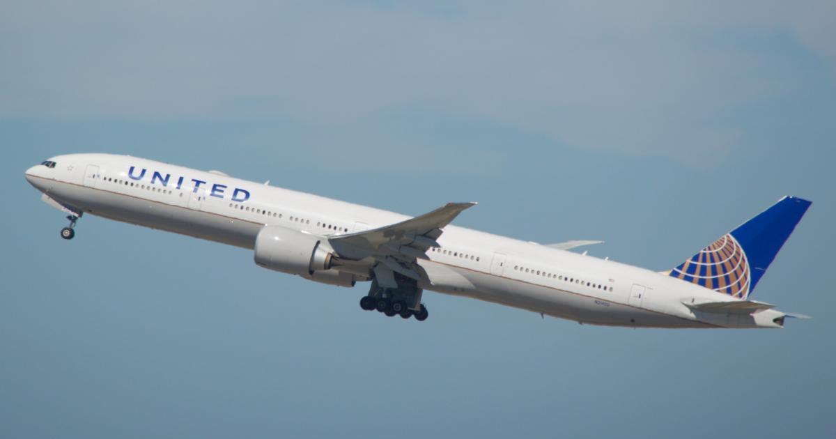 A United Airlines Boeing 777-300ER takes off from San Francisco International Airport in 2018. United will fly four aircraft to and from staging points outside Afghanistan to transport military personnel, civilians, and at-risk Afghanis to the U.S. (Photo: Flickr: <a href="http://creativecommons.org/licenses/by-sa/2.0/" target="_blank">Creative Commons (BY-SA)</a> by <a href="http://flickr.com/people/wbaiv" target="_blank">wbaiv</a>)