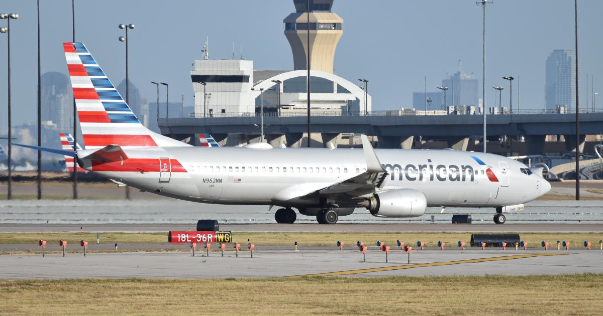 An American Airlines Boeing 737-800 taxis for departure from Dallas Fort Worth International Airport in October 2019. American participated in the NASA-FAA Airspace Technology Demonstration at Dallas and Charlotte over the past four years. (Photo: Flickr: <a href="http://creativecommons.org/licenses/by-sa/2.0/" target="_blank">Creative Commons (BY-SA)</a> by <a href="http://flickr.com/people/ajw1970" target="_blank">HawkeyeUK</a>)