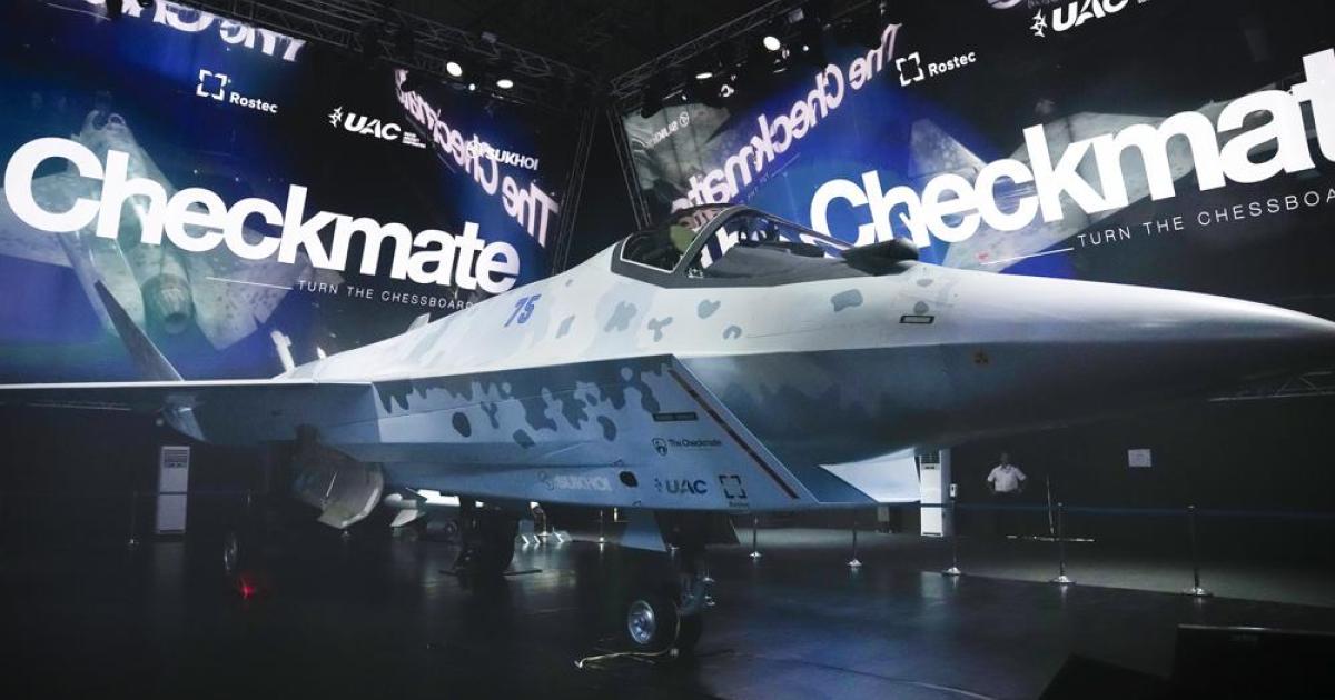A model of Russia's "Checkmate" fighter stands on display at Moscow's MAKS 2021 air show. 