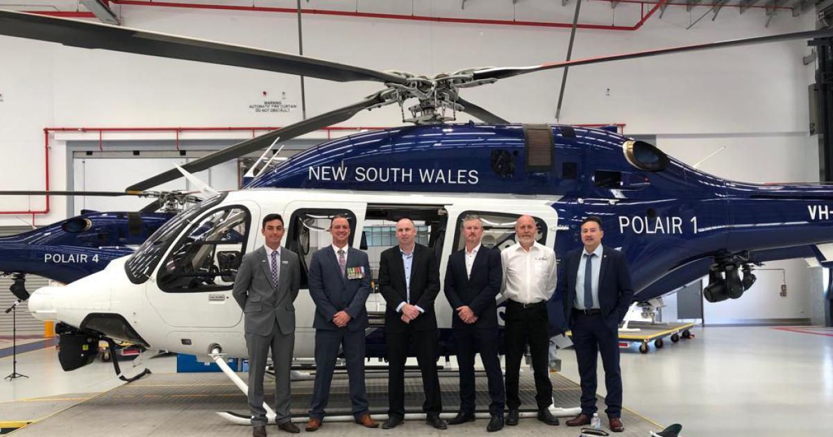 Officials in Australia’s New South Wales Police Force (NSWPF) Aviation Command pose next to one of the service's new Bell 429 helicopters. They will support the NSWPF in missions over a 300,000 square mile territory.